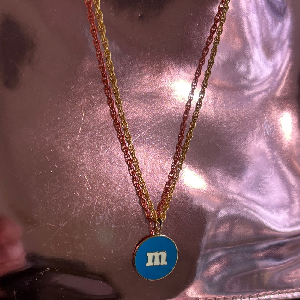 Chic Gold Necklace with Blue “M&M” Pendant